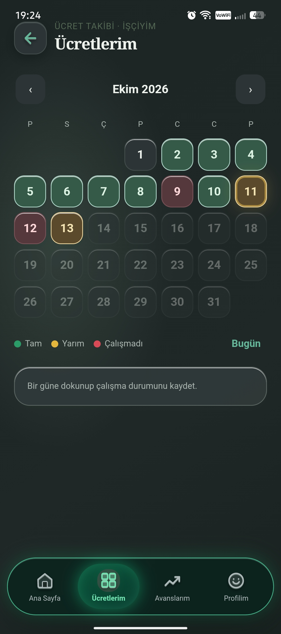 İşçi ücretlerim ekranında tam gün, yarım gün ve çalışmadı durumlarını gösteren aylık takvim